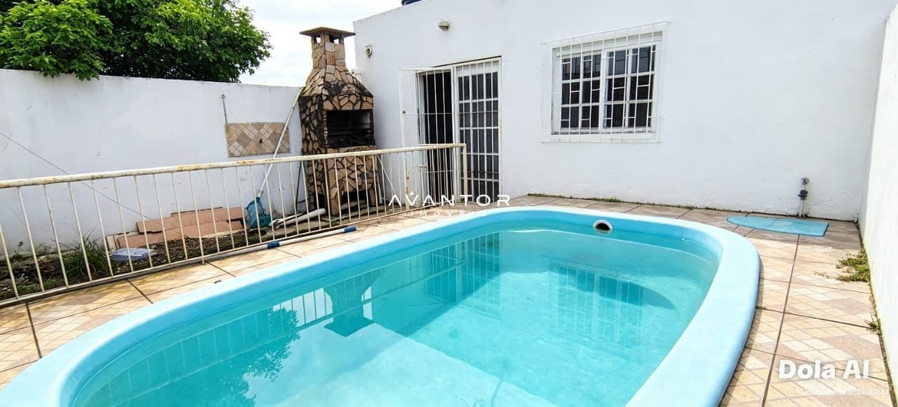 Piscina com churrasqueira e casa ao fundo — Casa com 2 quartos à venda no Residencial Terra Nova, em Cerrito, Santa Maria/RS
