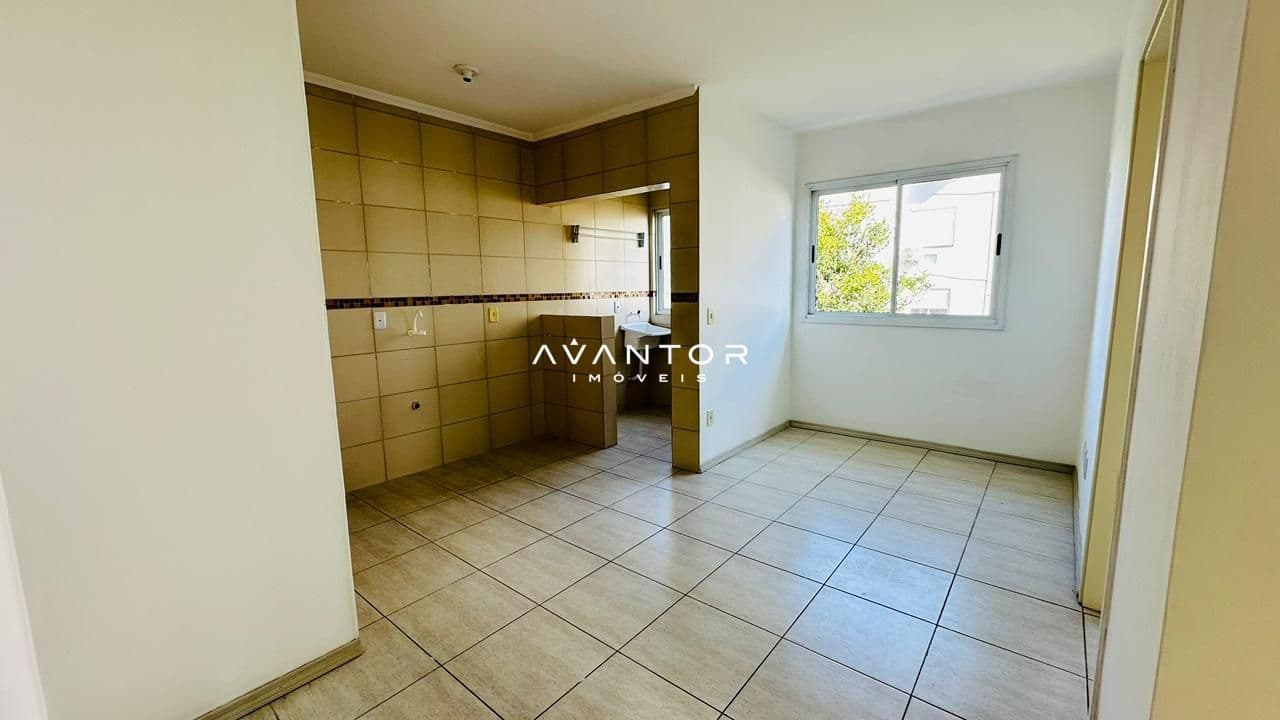 Cozinha com janela e azulejos amarelos — Apartamento com 1 quarto para alugar em Nossa Senhora do Rosário, Santa Maria/RS