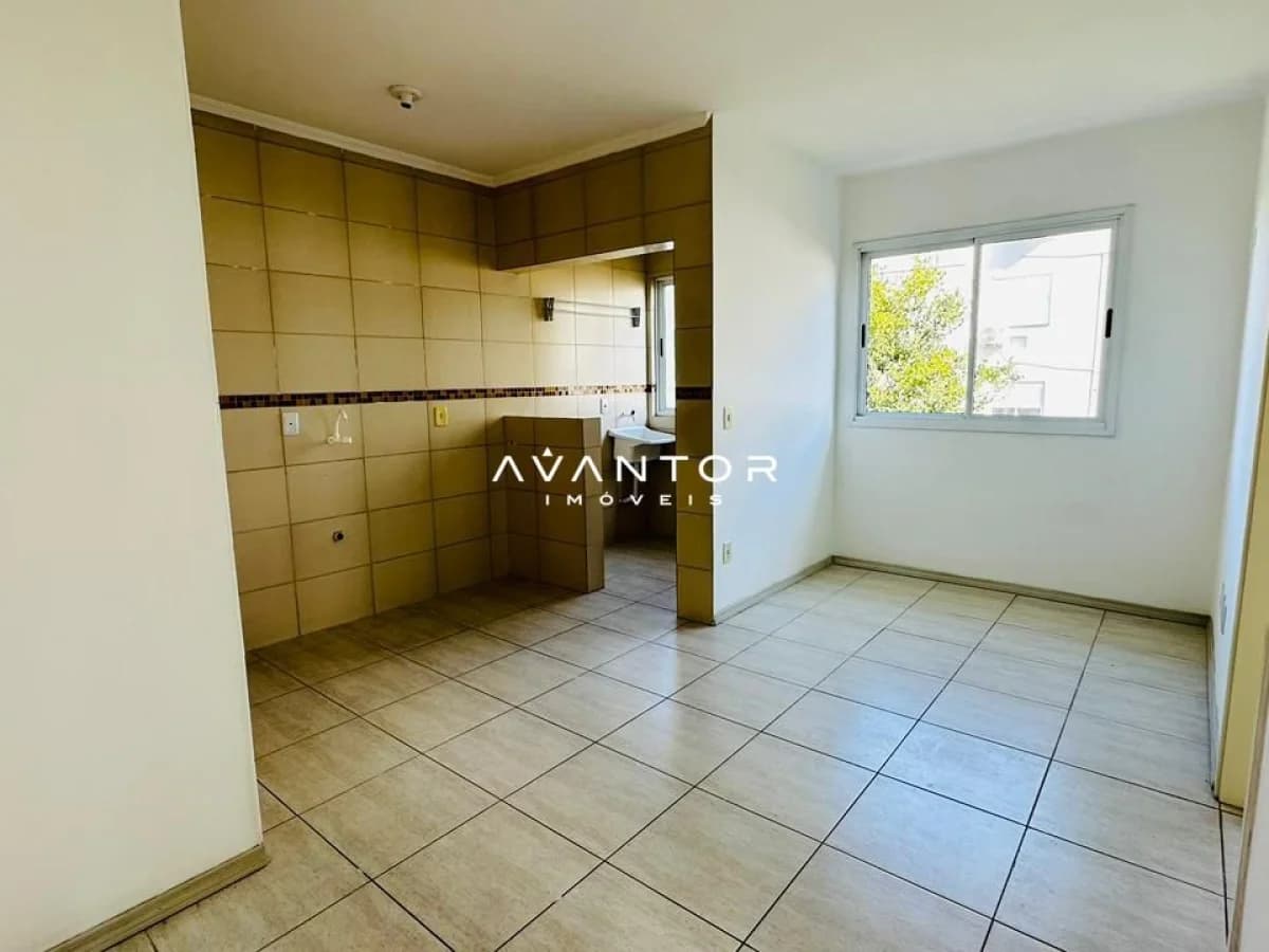 Cozinha com janela e azulejos amarelos — Apartamento com 1 quarto para alugar em Nossa Senhora do Rosário, Santa Maria/RS
