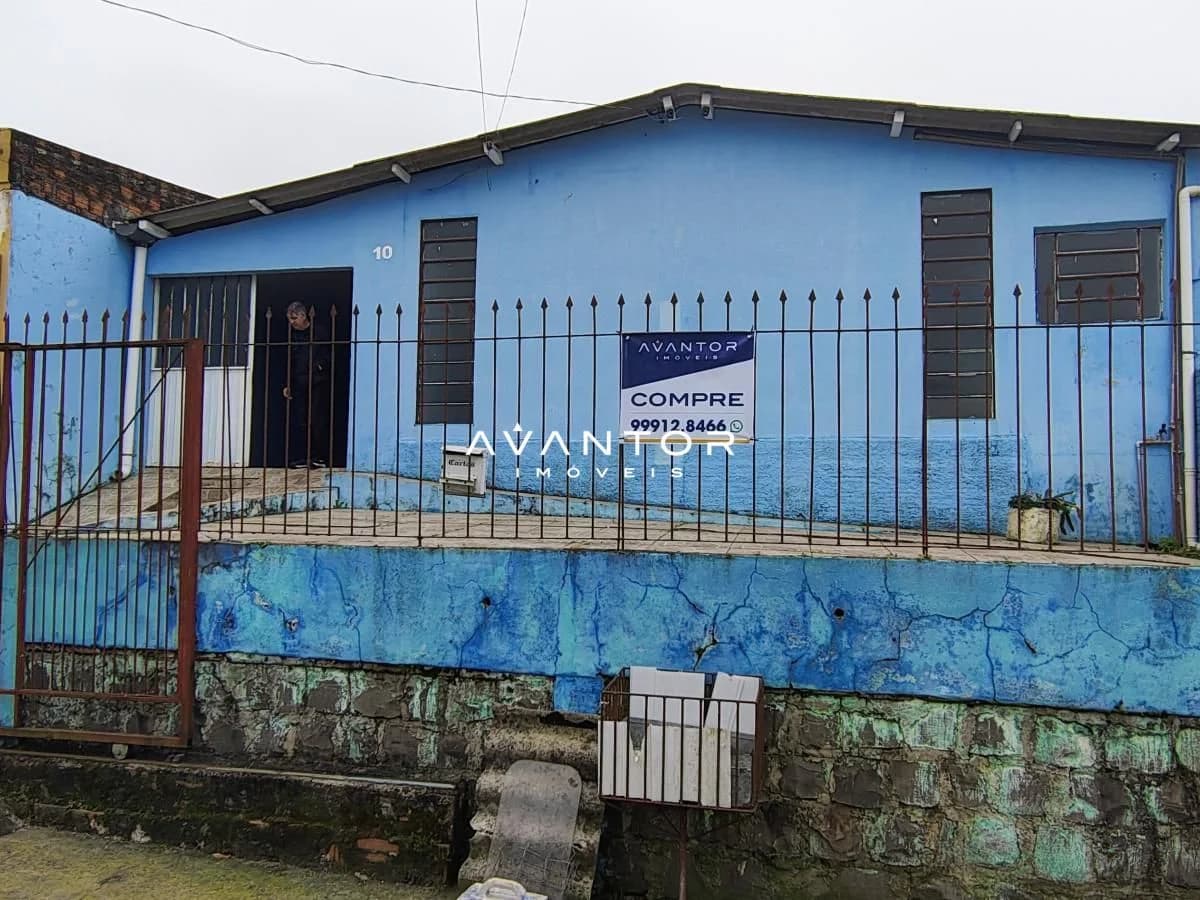 Fachada da casa com portão de entrada — Casa com 3 quartos à venda em Tancredo Neves, Santa Maria/RS