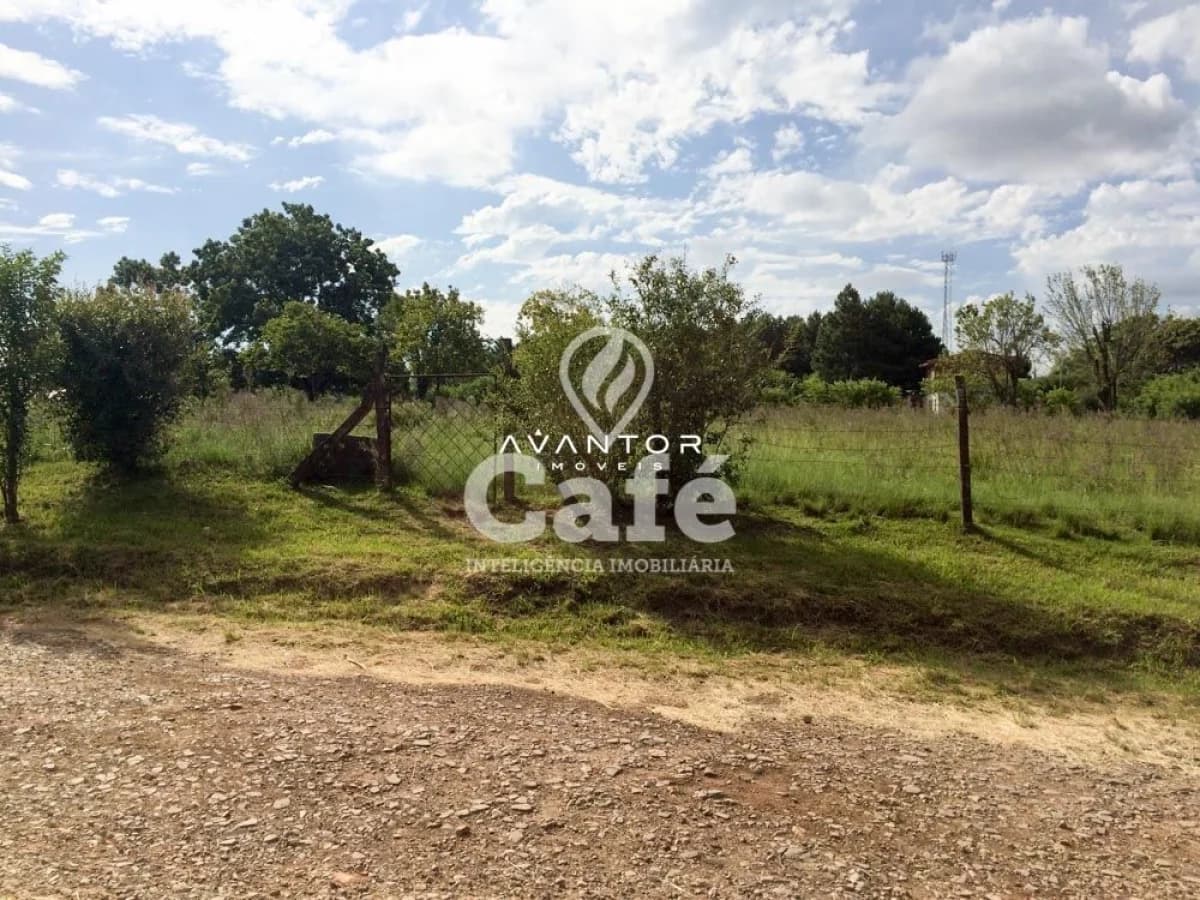 Terreno com vegetação e cerca — Terreno à venda em Diácono João Luiz Pozzobon, Santa Maria/RS