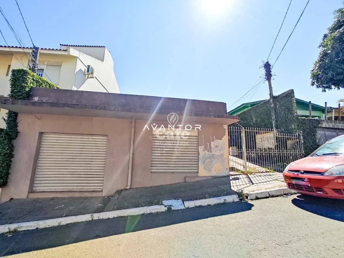 Fachada da casa com garagem — Casa com 3 quartos à venda em Nossa Senhora do Rosário, Santa Maria/RS