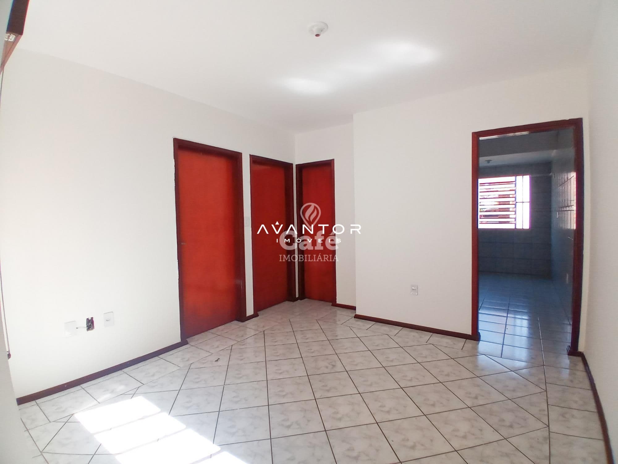 Sala com portas em vermelho — Apartamento com 2 quartos à venda em Pinheiro Machado, Santa Maria/RS