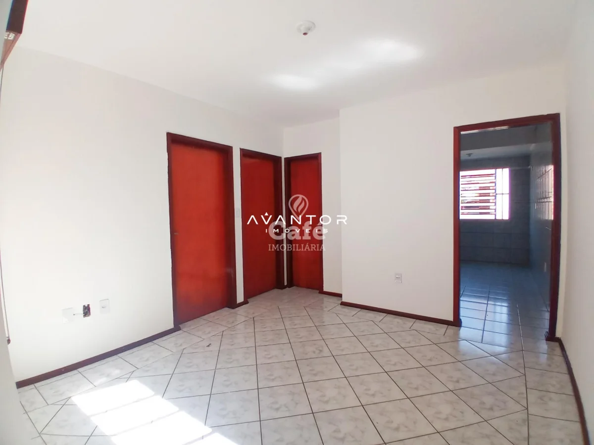 Sala com portas em vermelho — Apartamento com 2 quartos à venda em Pinheiro Machado, Santa Maria/RS