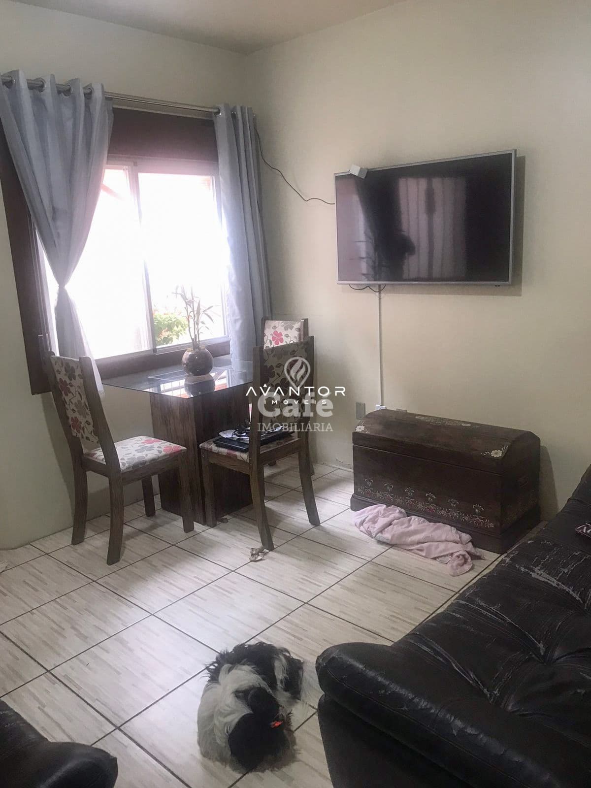 Sala de estar com janela e TV — Apartamento com 3 quartos à venda em Pinheiro Machado, Santa Maria/RS