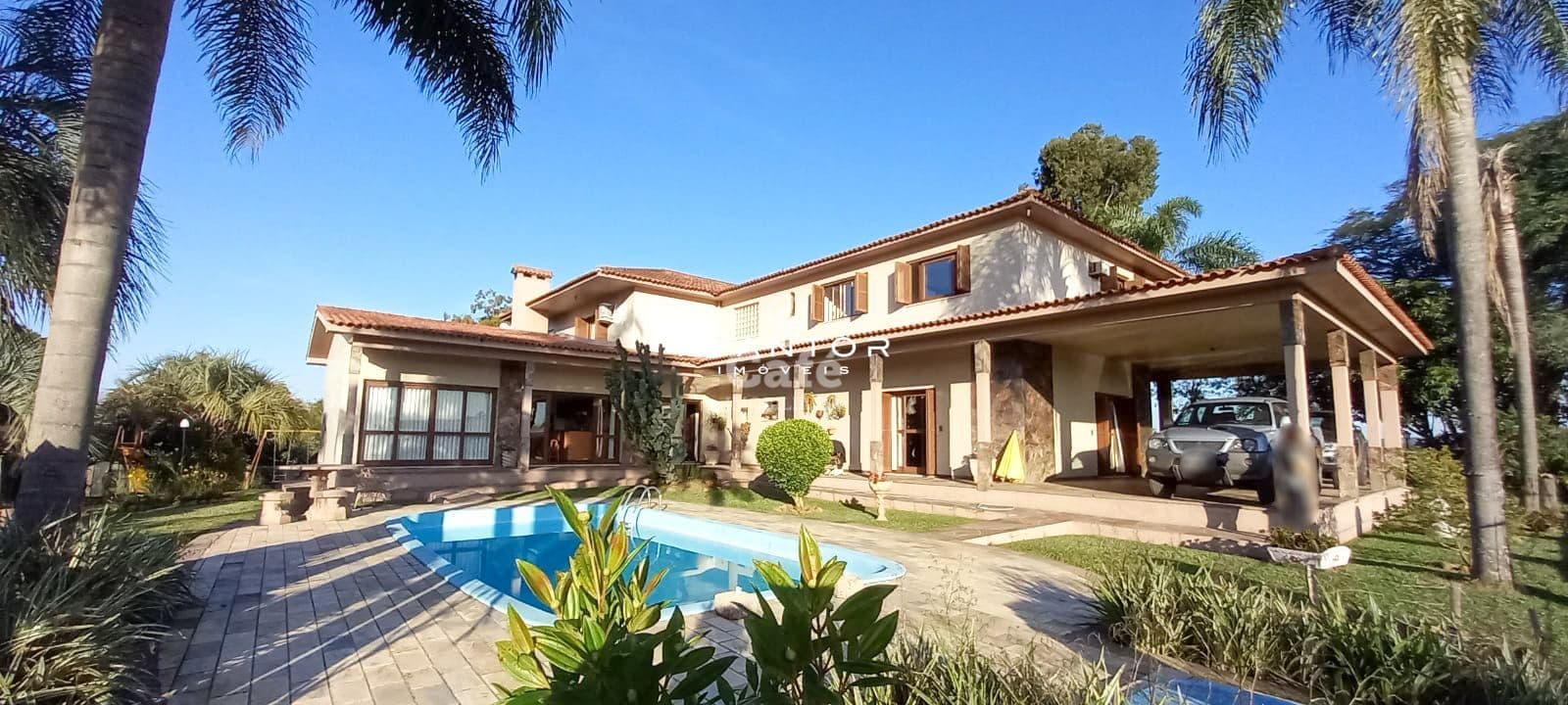 Fachada da casa com piscina — Campo à venda em Pinheiro Machado, Santa Maria/RS