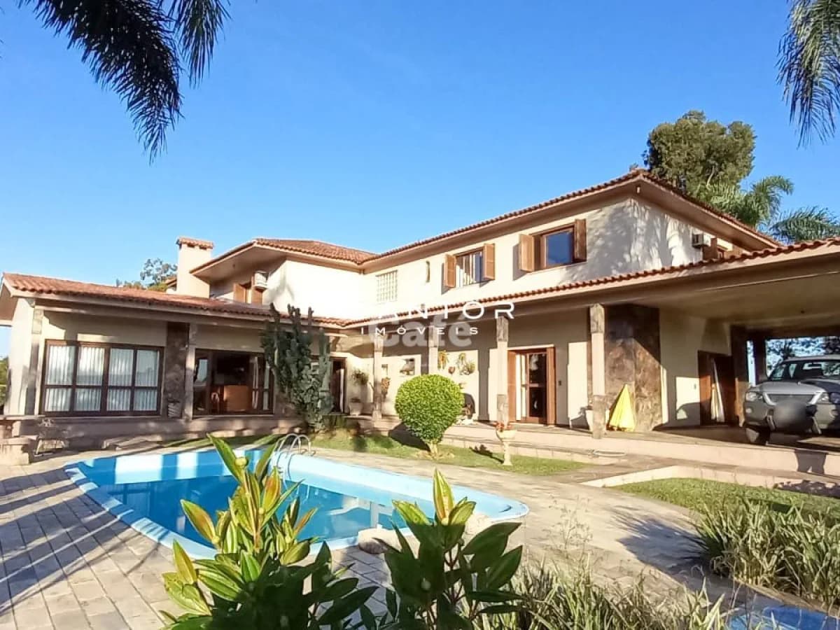 Fachada da casa com piscina — Campo à venda em Pinheiro Machado, Santa Maria/RS