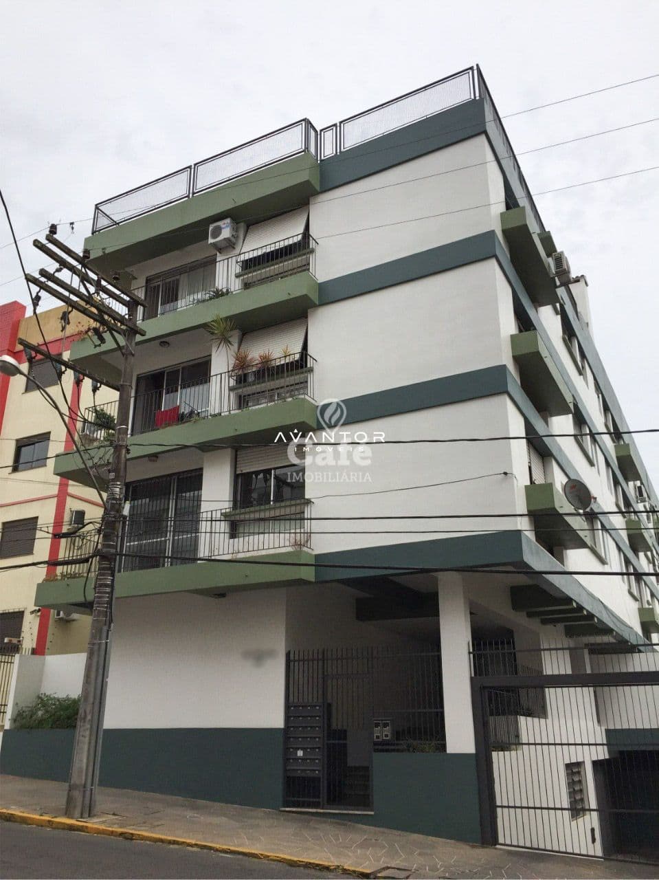 Fachada do prédio com sacadas — Apartamento com 1 quarto à venda no Edifício Málaga, em Centro, Santa Maria/RS