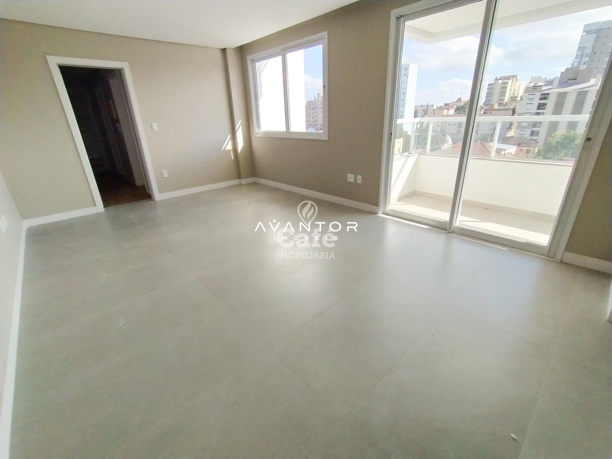 Sala de estar com sacada e vista para cidade — Apartamento com 2 quartos à venda em Centro, Santa Maria/RS