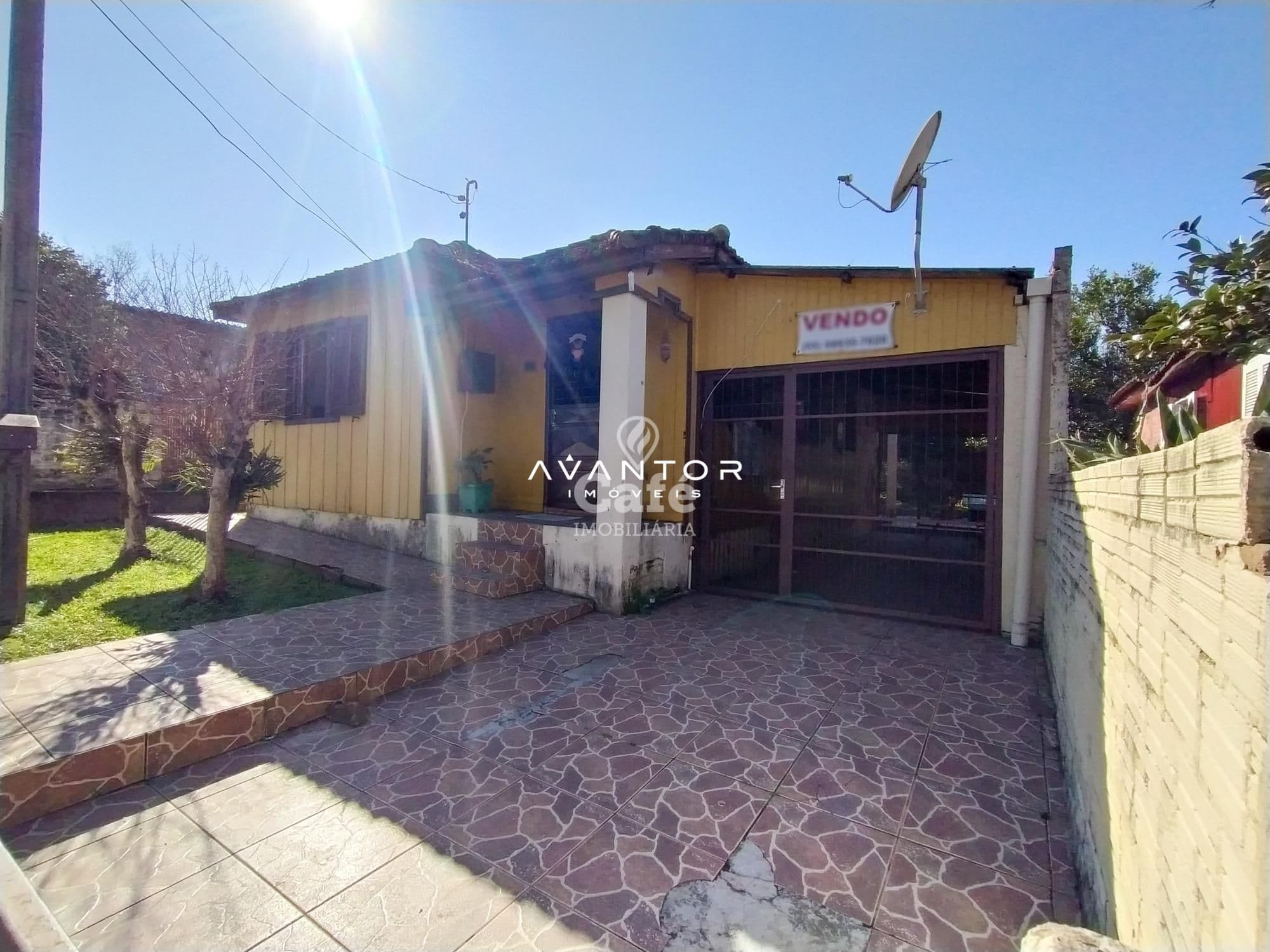 Fachada da casa com garagem — Terreno à venda em Noal, Santa Maria/RS