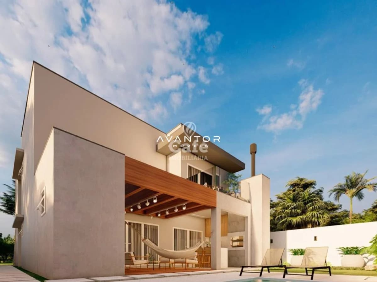Fachada da casa com varanda integrada — Terreno à venda no Cidade Universitária, em Camobi, Santa Maria/RS