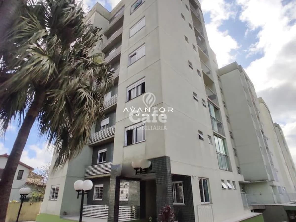 Fachada do prédio com palmeira — Apartamento com 2 quartos à venda no Residencial Nogueiras, em Bonfim, Santa Maria/RS