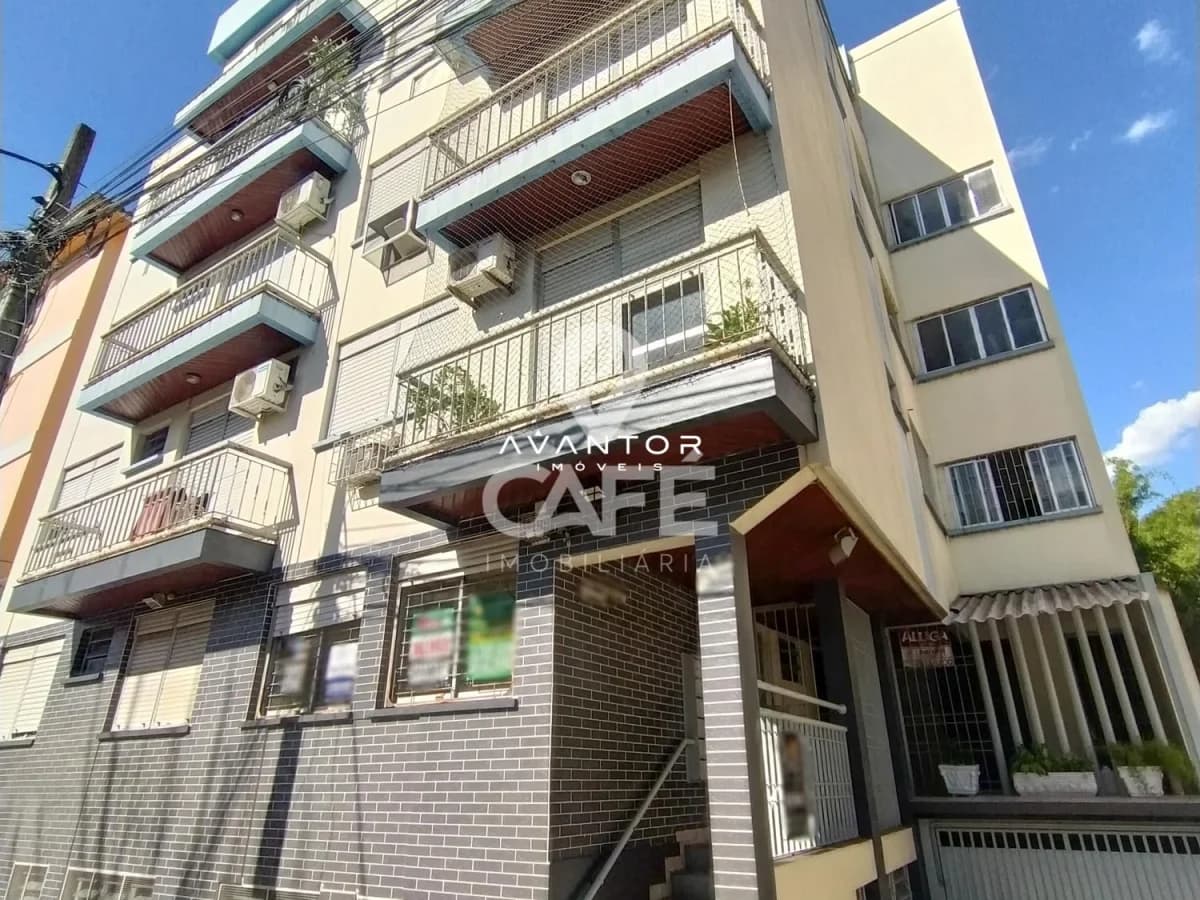Fachada do edifício com térreo comercial — Apartamento com 2 quartos à venda em Nossa Senhora de Fátima, Santa Maria/RS