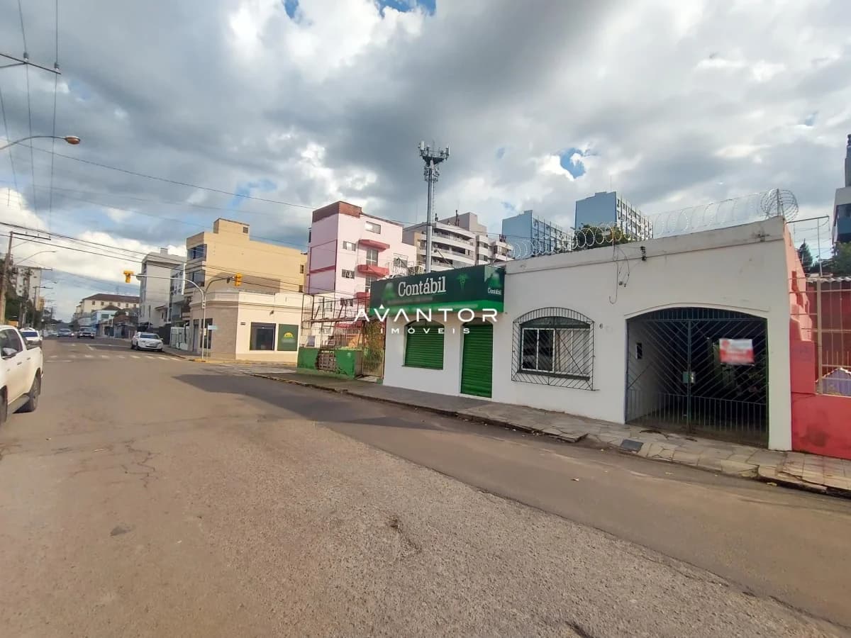 Fachada da construção com logotipo de imobiliária — Terreno à venda em Bonfim, Santa Maria/RS