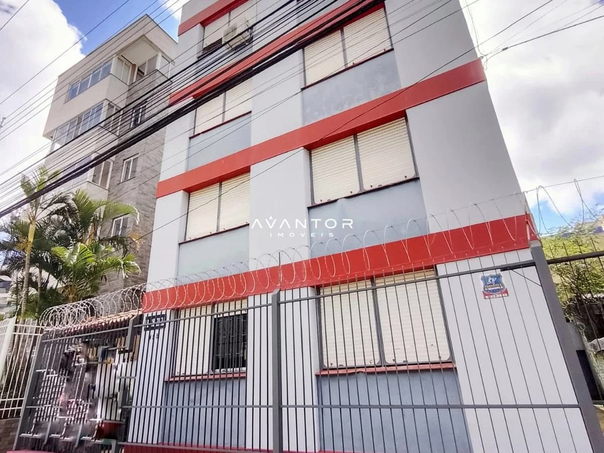 Fachada do prédio com faixa vermelha — Apartamento com 2 quartos à venda em Nossa Senhora do Rosário, Santa Maria/RS