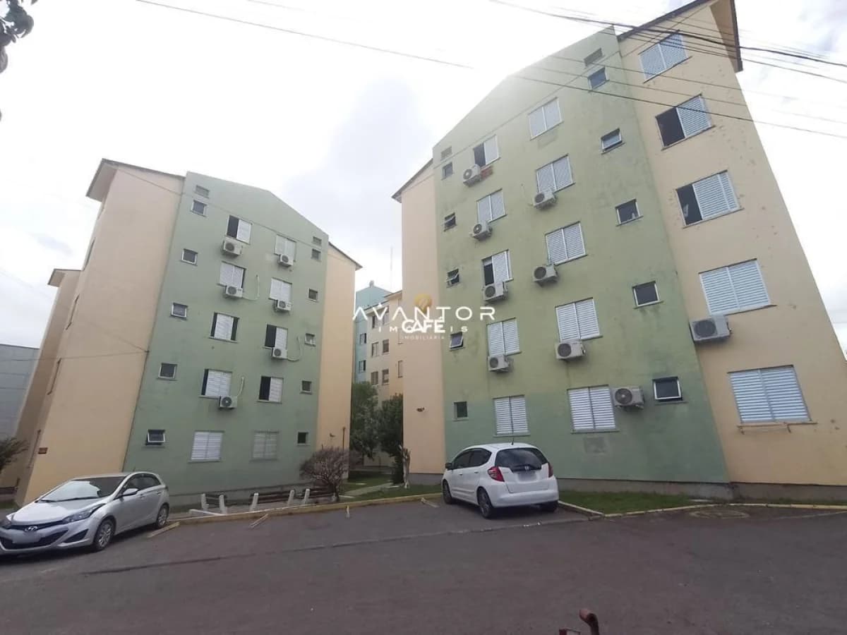 Fachada do prédio com garagem — Apartamento com 2 quartos à venda no Residencial Vento Norte, em Urlândia, Santa Maria/RS