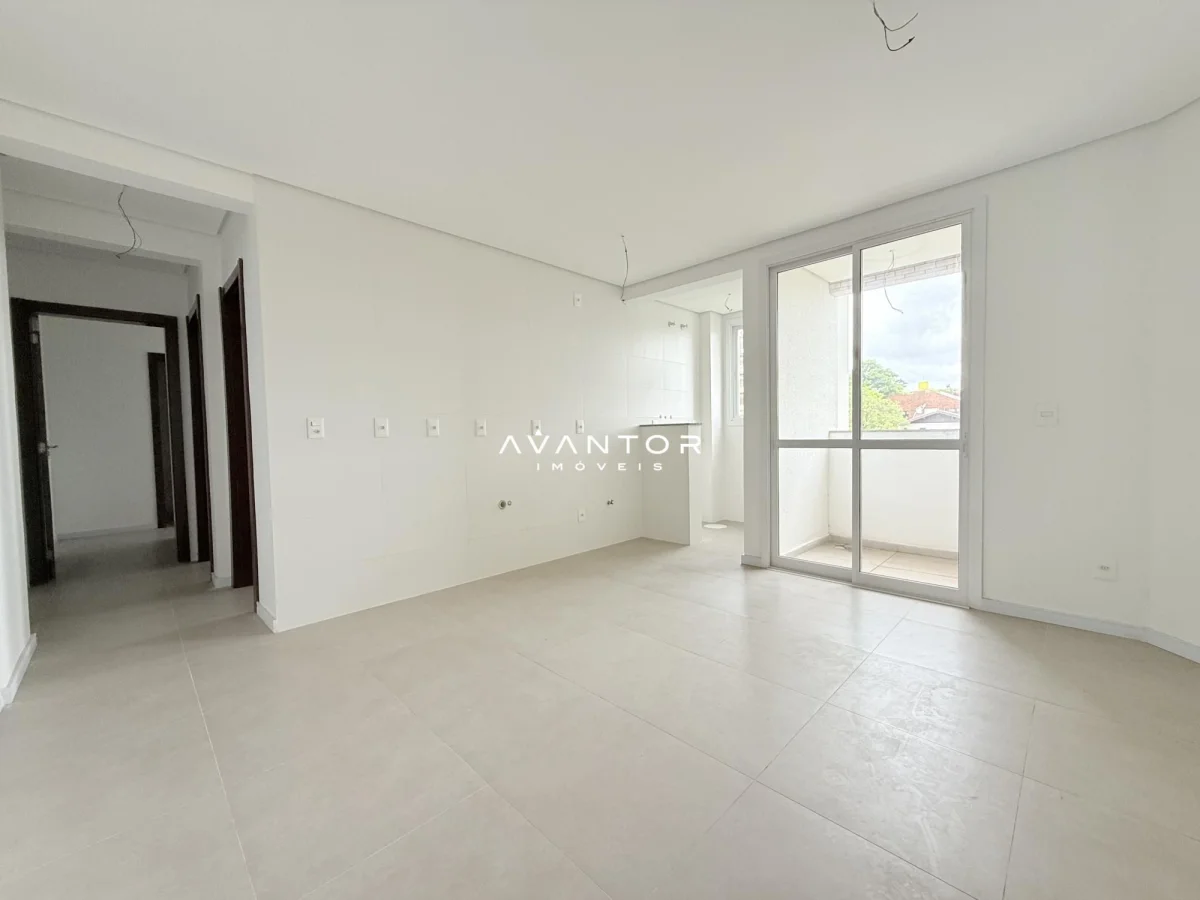 Sala de estar com sacada — Apartamento com 2 quartos à venda em Nossa Senhora de Lourdes, Santa Maria/RS