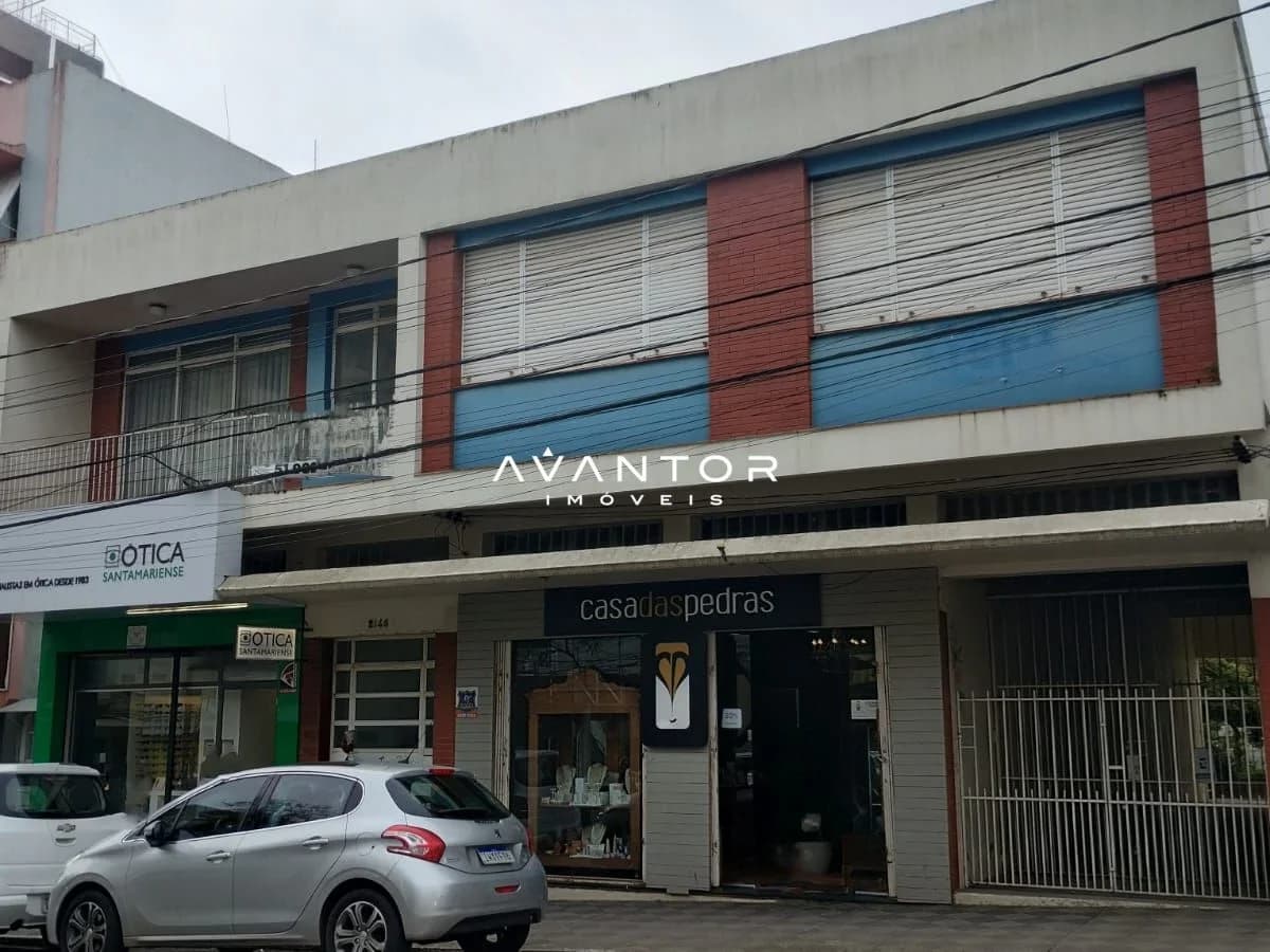 Fachada do prédio com lojas no térreo — Terreno à venda em Nossa Senhora de Fátima, Santa Maria/RS