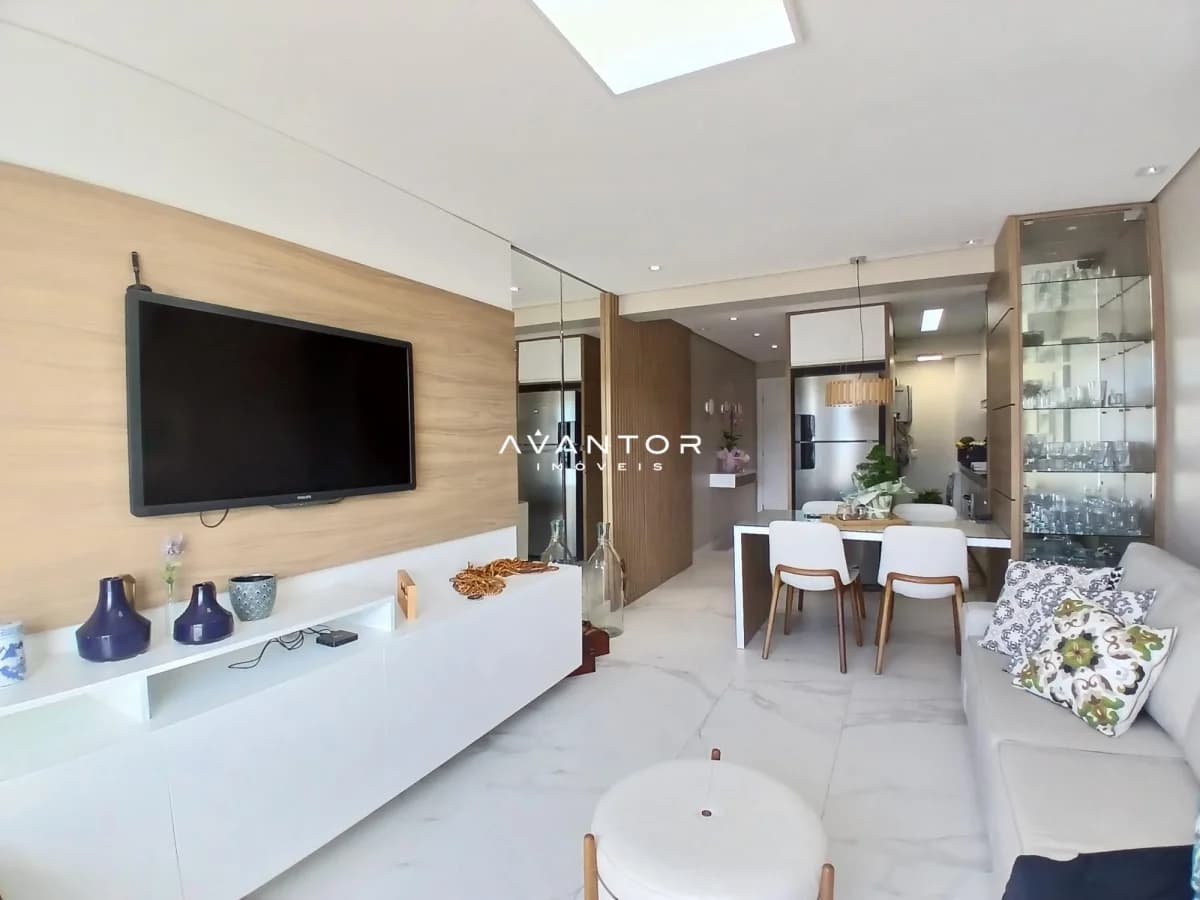 Sala de estar integrada à cozinha com ilha — Apartamento com 2 quartos à venda no Sunset Residence, em Centro, Santa Maria/RS