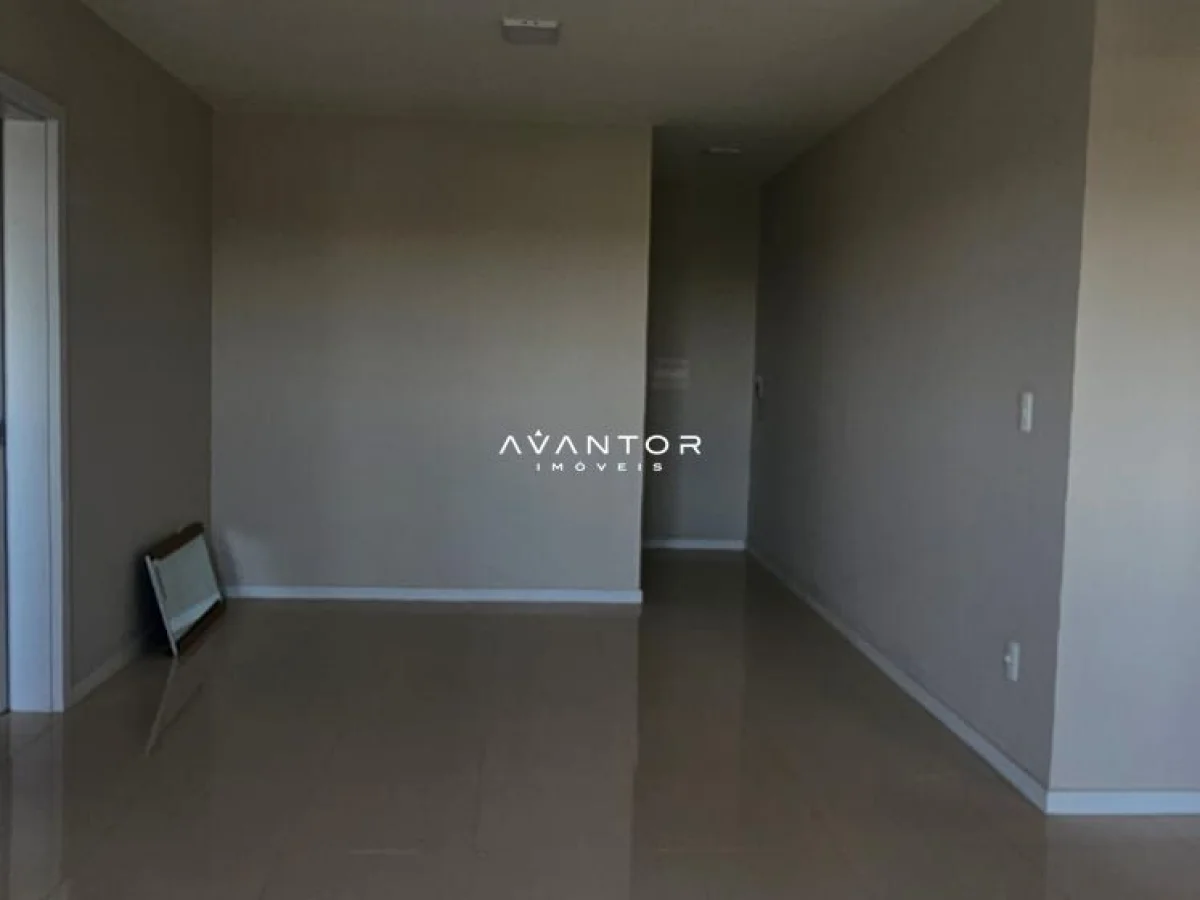 Ambiente interno com piso cinza — Apartamento com 3 quartos à venda no Edifício Lisboa, em Uglione, Santa Maria/RS