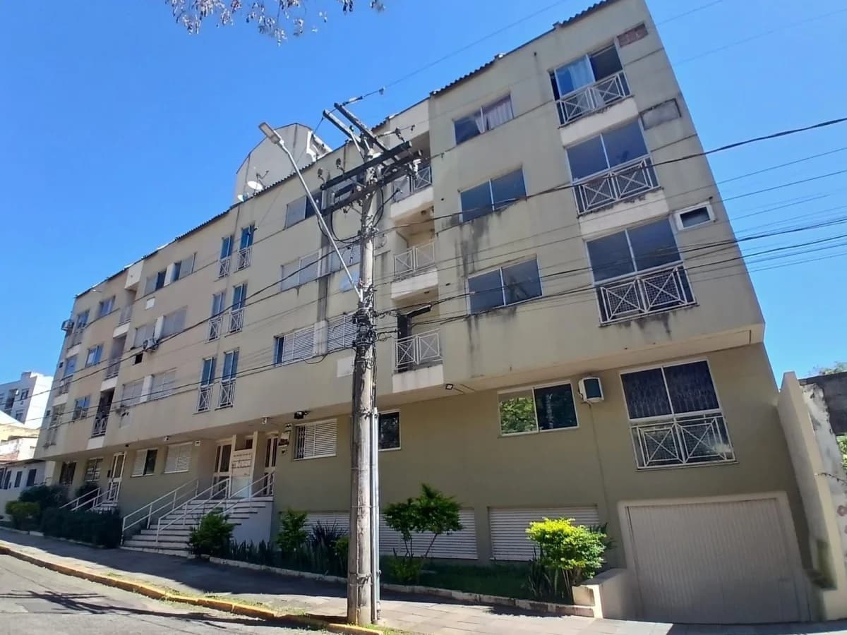 Apartamento Central de 2 dormitórios, sala de estar, banheiro social, cozinha e área de se — Apartamento com 2 quartos à venda em Centro, Santa Maria/RS