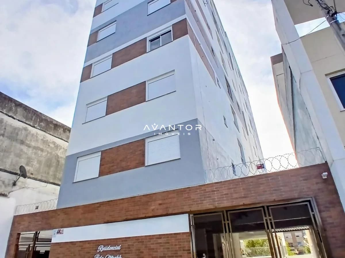 Fachada do prédio com detalhes em madeira — Apartamento com 1 quarto à venda em Bonfim, Santa Maria/RS