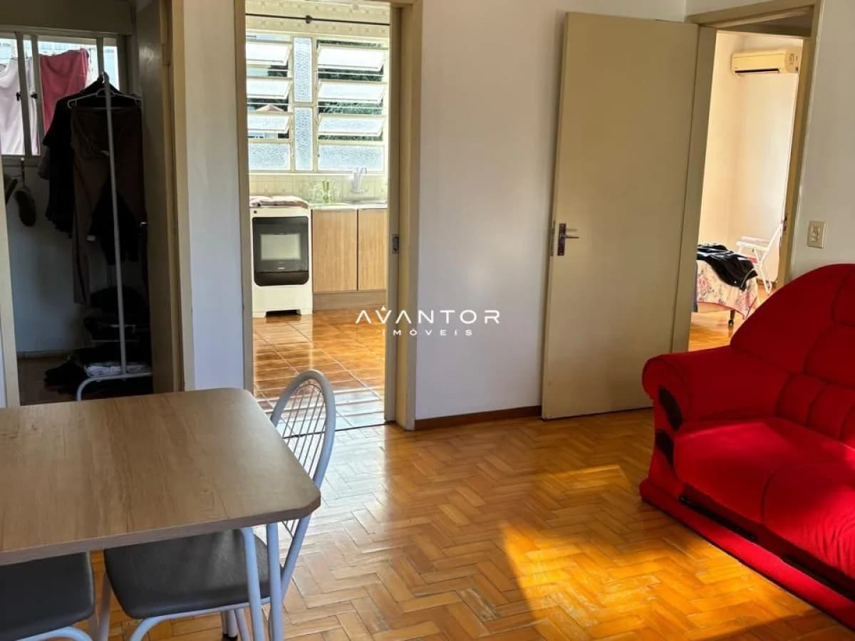 Sala de estar integrada à cozinha — Apartamento com 2 quartos à venda no Edifício A Hangá, em Centro, Santa Maria/RS