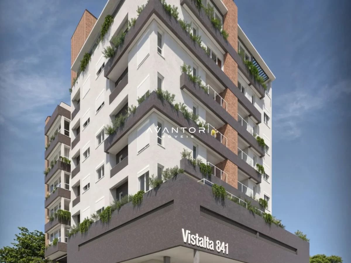 Fachada do prédio com sacadas e vegetação — Apartamento com 3 quartos à venda em Nossa Senhora de Fátima, Santa Maria/RS
