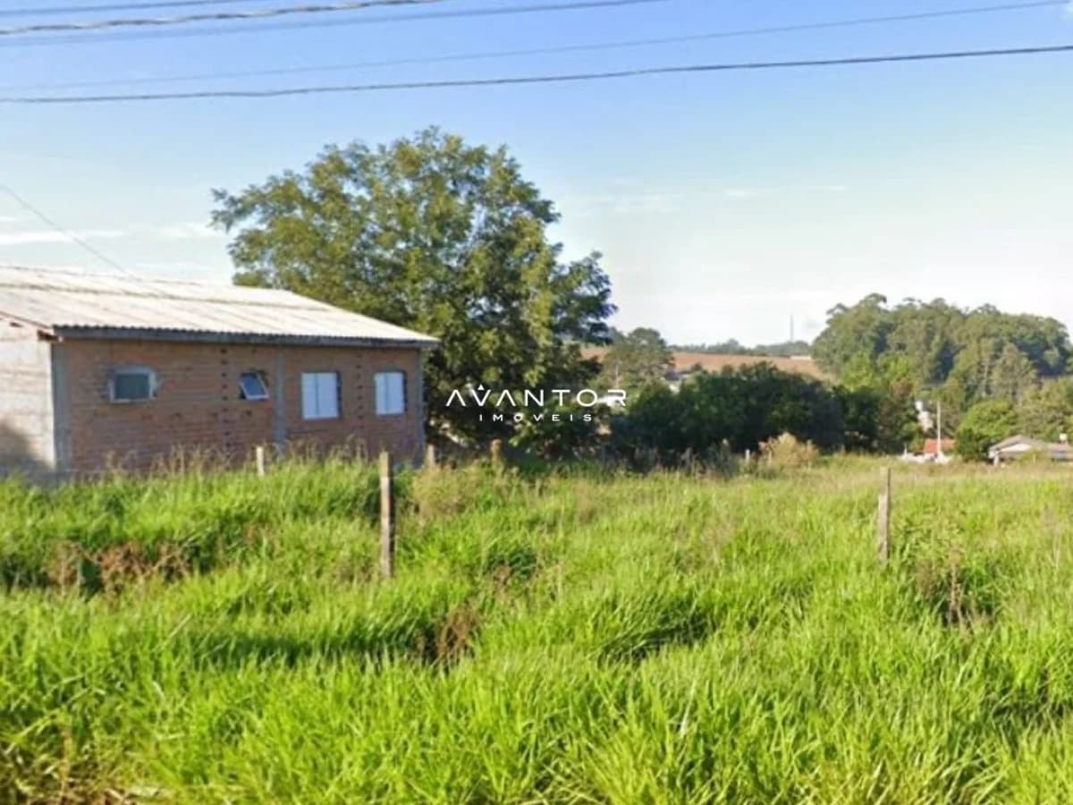 Fachada da casa com terreno — Terreno à venda em Passo das Tropas, Santa Maria/RS