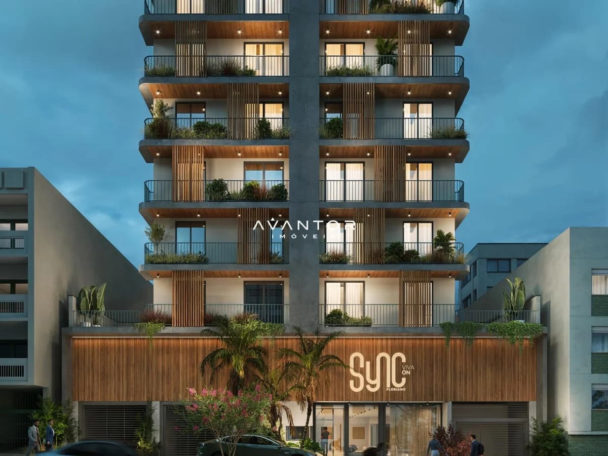 Fachada do prédio com sacadas e vegetação — Apartamento com 1 quarto à venda em Centro, Santa Maria/RS