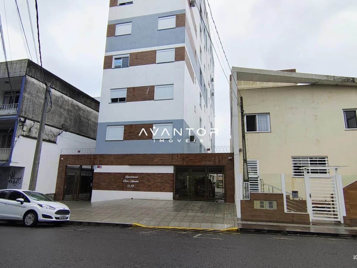 Fachada do prédio com garagem — Apartamento com 1 quarto à venda no Residencial Bela Manhã, em Bonfim, Santa Maria/RS