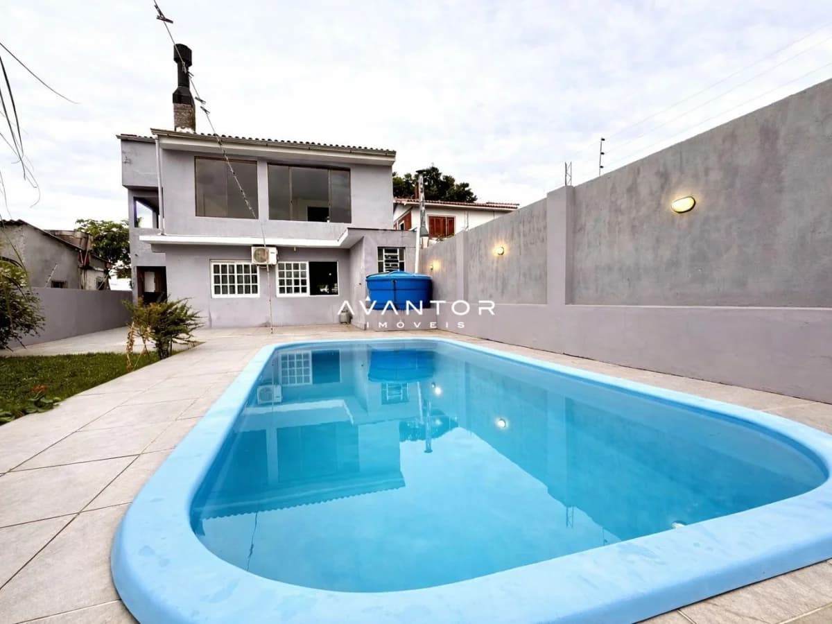 Pátio com piscina e árvores frutíferas — Casa com 5 quartos à venda em Nossa Senhora do Rosário, Santa Maria/RS
