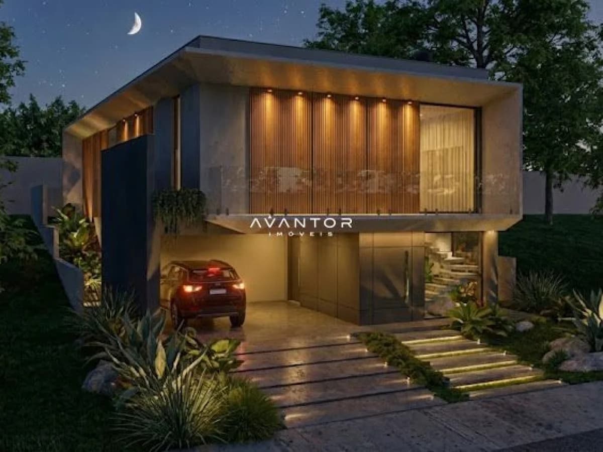 Fachada da casa à noite com garagem — Casa com 3 quartos à venda no Estância dos Montes, em Tomazetti, Santa Maria/RS