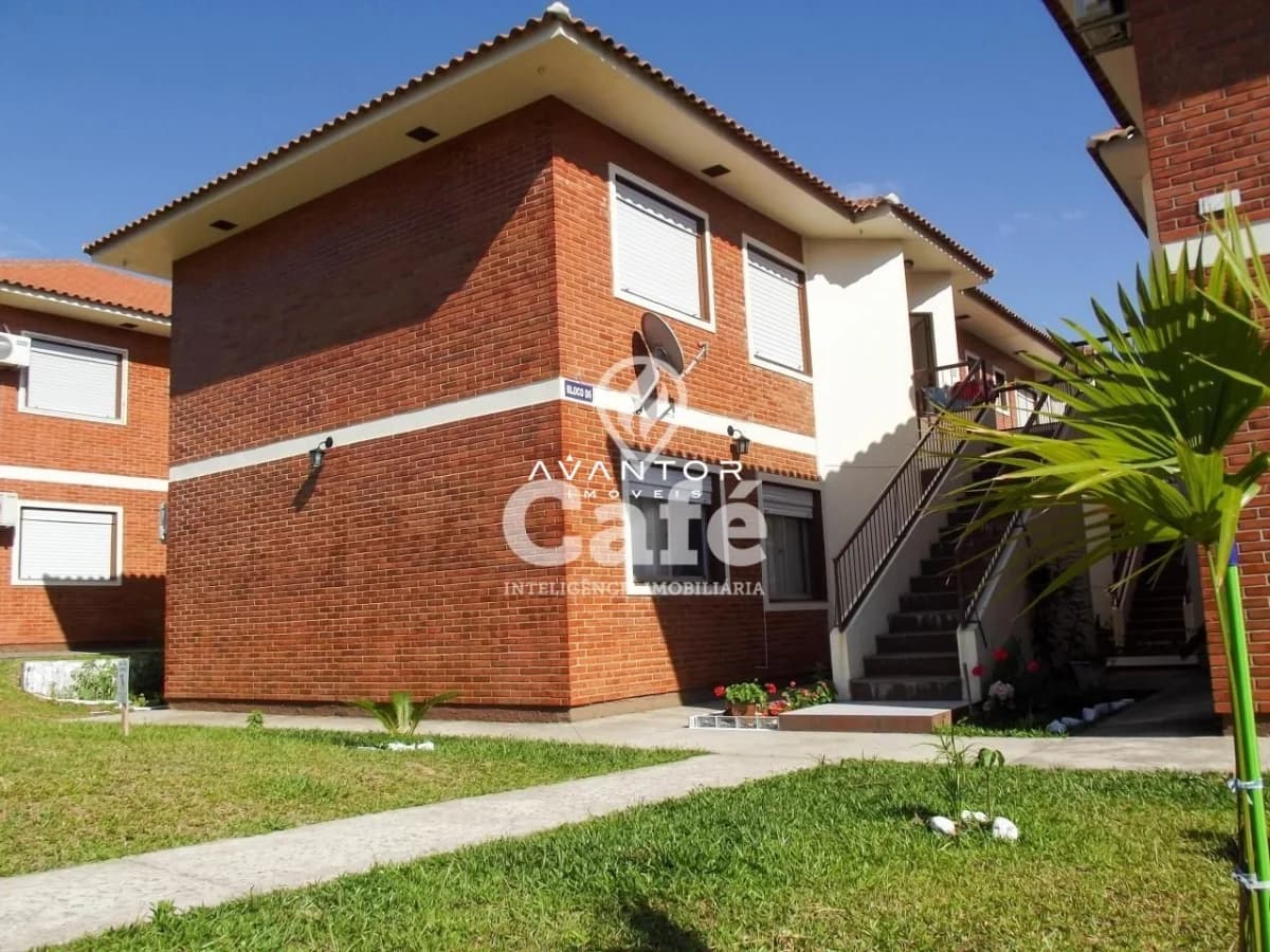 Fachada da casa com jardim frontal — Apartamento com 2 quartos para alugar em Pinheiro Machado, Santa Maria/RS