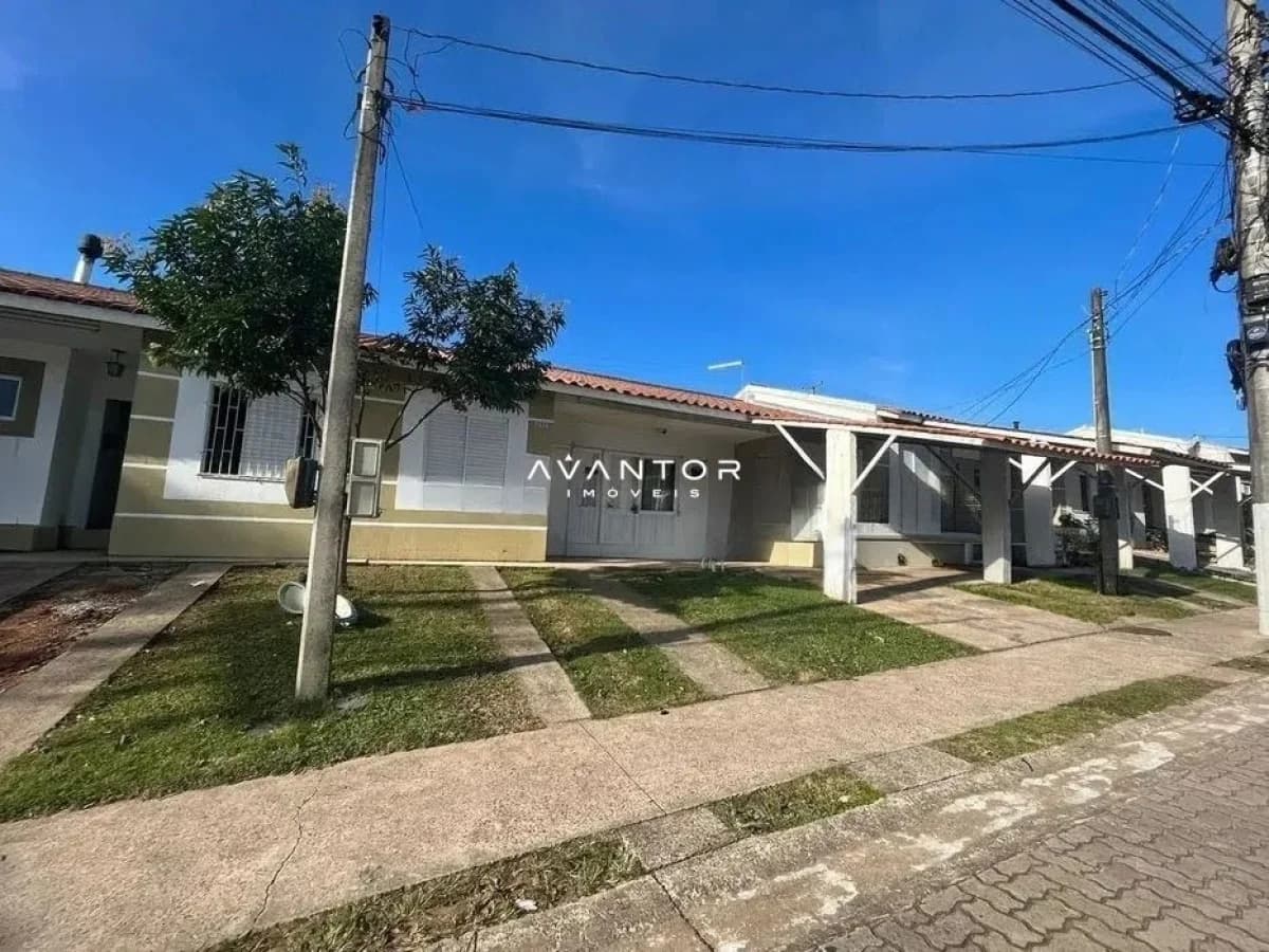 Fachada da casa com garagem — Casa com 2 quartos para alugar no Condomínio Moradas Santa Maria, em Cerrito, Santa Maria/RS