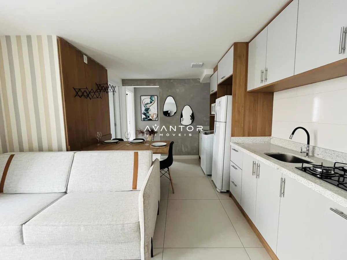 Cozinha integrada à sala com armários planejados — Apartamento com 2 quartos à venda em Centro, Santa Maria/RS