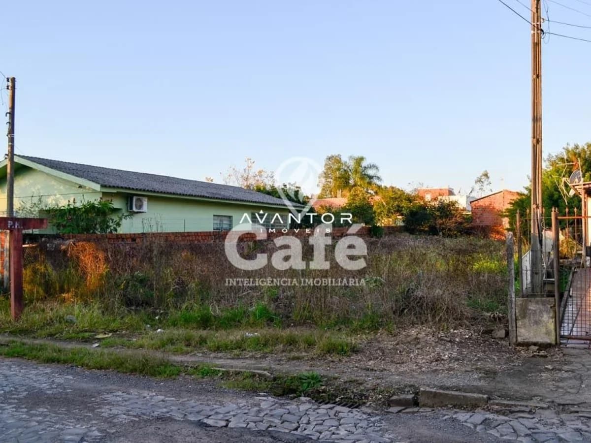 Fachada da casa com terreno — Terreno à venda em São José, Santa Maria/RS